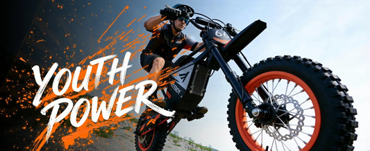 Freeboy Y66 electric dirt bike parked on a dirt trail