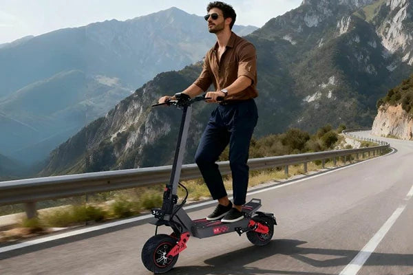 FREEBOY off-road scooter rider driving on mountain scenic trail