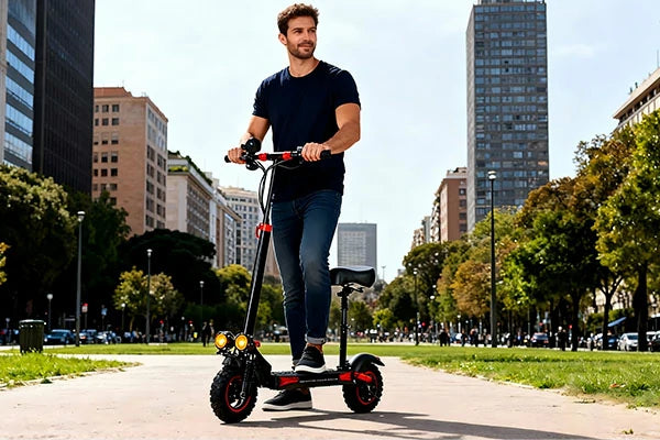 FREEBOY electric scooter male rider moving on downtown city street