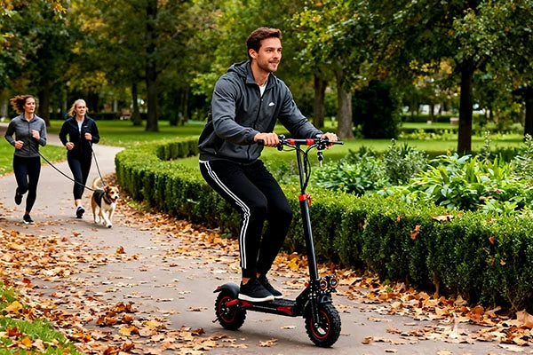 FREEBOY foldable electric scooter rider traveling along woodland pathway