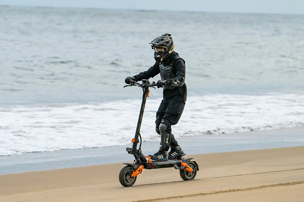 FREEBOY H9 electric scooter static display on open beach coastline