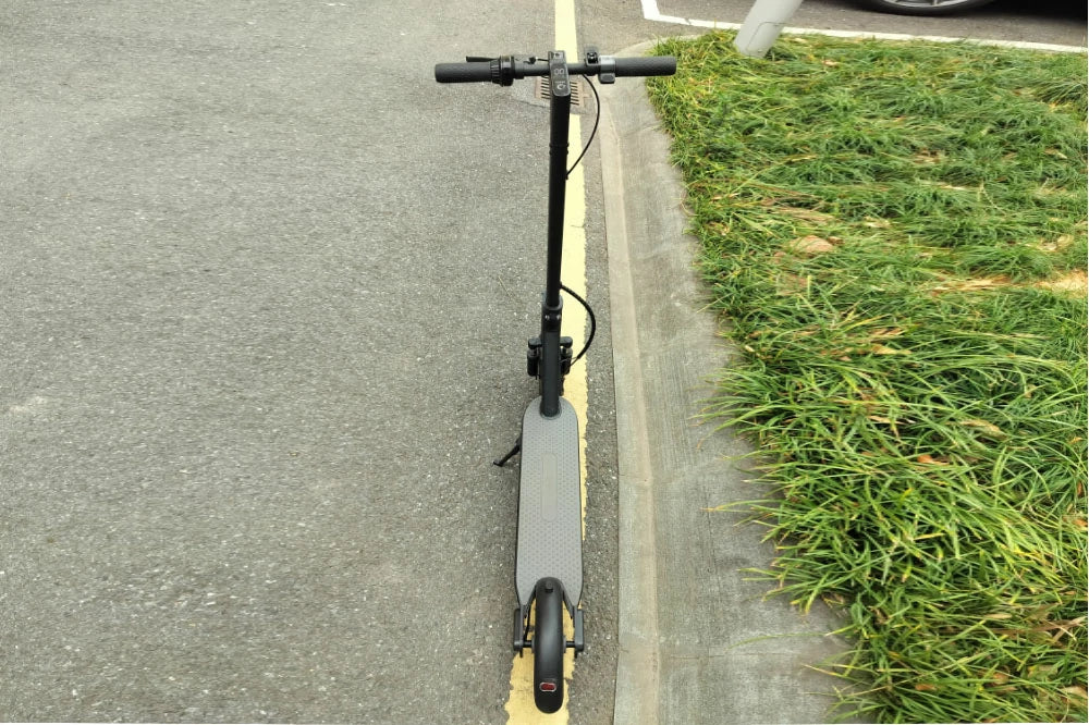 FREEBOY J05 lightweight electric scooter outdoor roadside front view photo